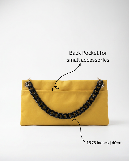 "Back view of The PointeBag By Ballerina in yellow — 15.75 inch ballet bag with back pocket for small accessories and black chain strap"