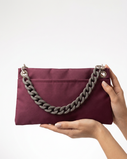 Back of burgundy PointeBag held in hands - ballet bag with chunky chain strap"