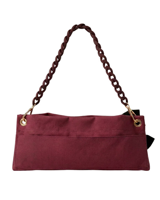 Back view of Burgundy Polka Edit pointe shoe bag — velcro back pocket and gold hardware eyelets, by PointeBag By Ballerina