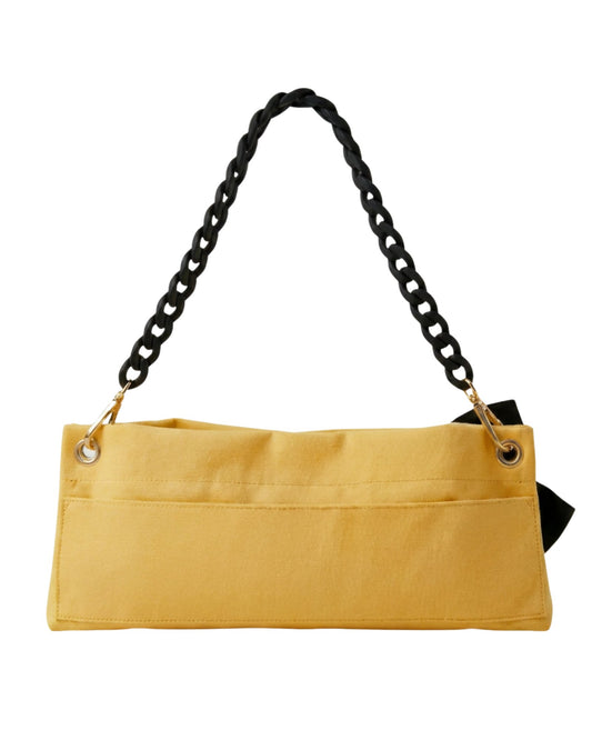 Back view of Butter Yellow Polka Edit pointe shoe bag — velcro back pocket and gold hardware eyelets, by PointeBag By Ballerina