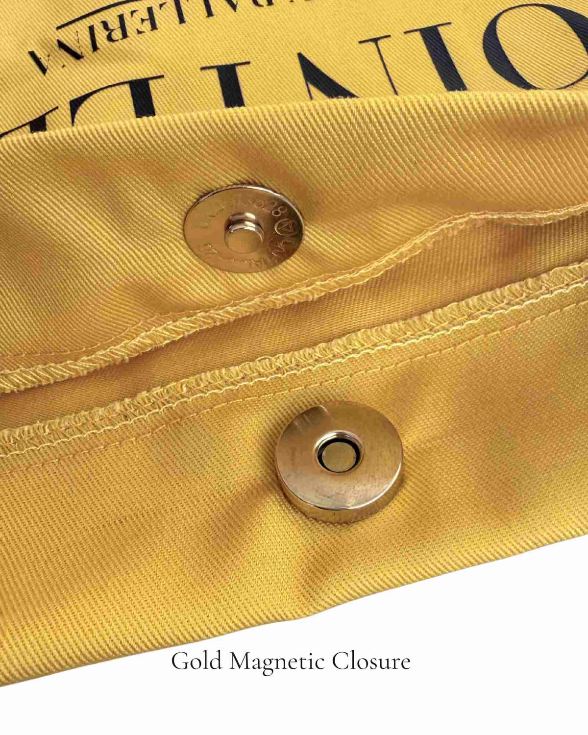 Close-up of gold magnetic closure on Butter Yellow Polka Edit pointe shoe bag — 220g cotton canvas, by PointeBag By Ballerina