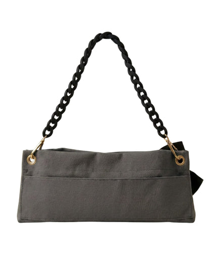 Back view of The PointeBag Dark Grey Polka Edit — velcro back pocket, gold hardware eyelets and black velvety chain strap, by PointeBag By Ballerina