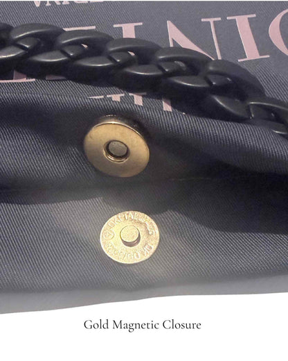 Close-up of gold magnetic closure on The PointeBag Dark Grey Polka Edit — secure snap detail on 220g dark grey cotton  with black velvety chain, by PointeBag By Ballerina
