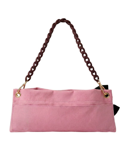 Pink Polka Edit PointeBag back view — dark coffee chain, gold hardware, a blush pink cotton canvas pointe shoe bag by PointeBag By Ballerina