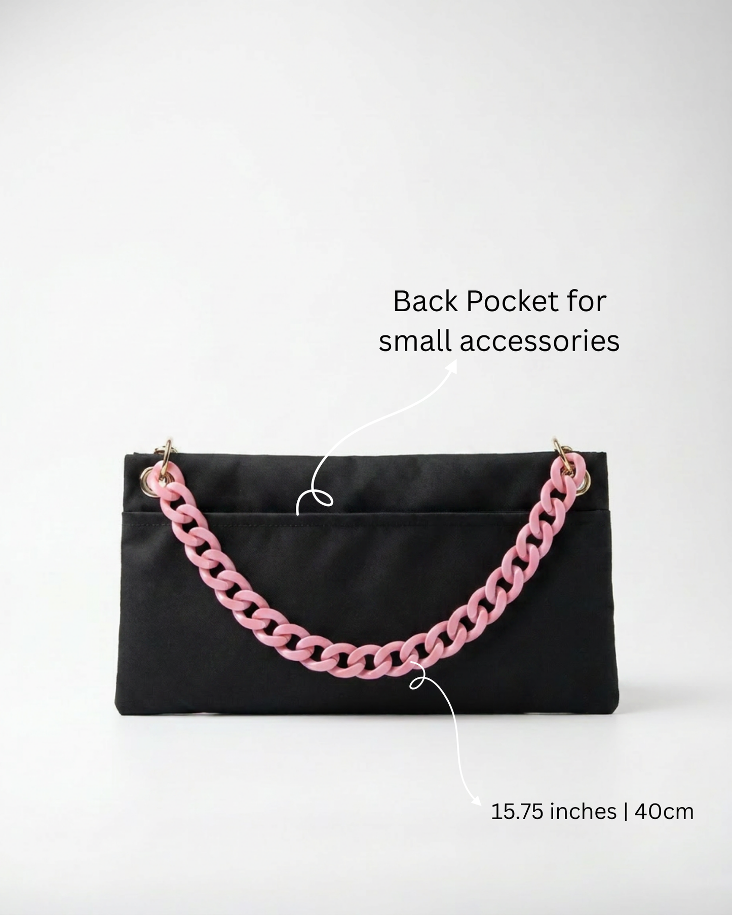 "Back view of The PointeBag By Ballerina in black — 15.75 inch ballet bag with back pocket for small accessories and pink chain strap"