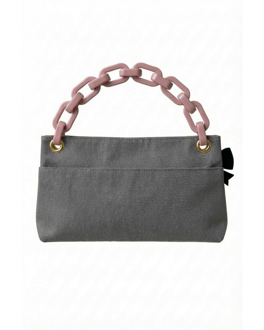 The Grey Classic PointeBag | our Custom made Pointe/ Ballet Shoe bag on the back side where there is a back long pocket. There are two gold eyelets where the plastic pink strap snaps on.