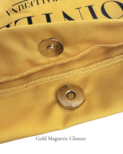 Close-up of gold magnetic closure on Butter Yellow Polka Edit pointe shoe bag — 220g cotton canvas, by PointeBag By Ballerina
