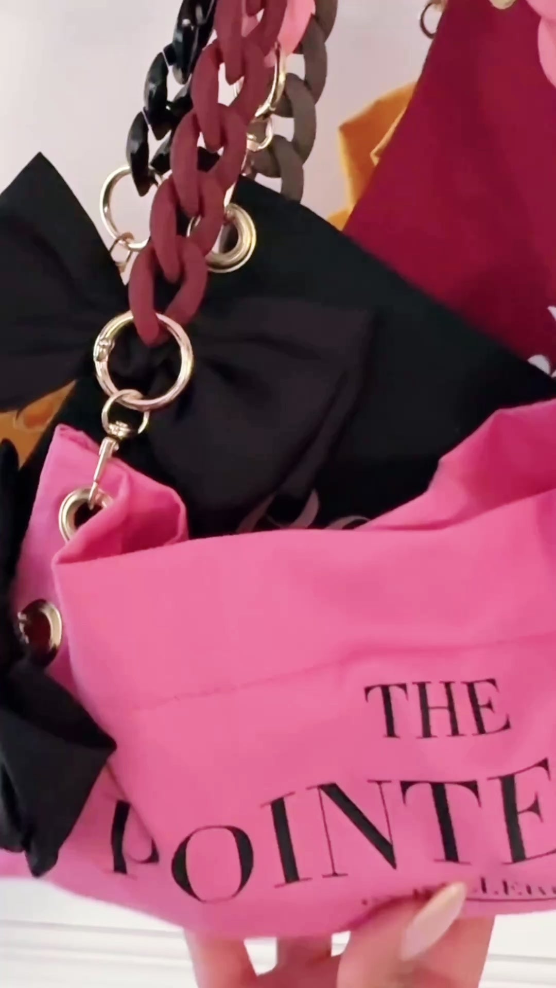 "PointeBag detail video — cotton fabric ballet bag, swappable chains, custom clips and sweet vanilla scent"